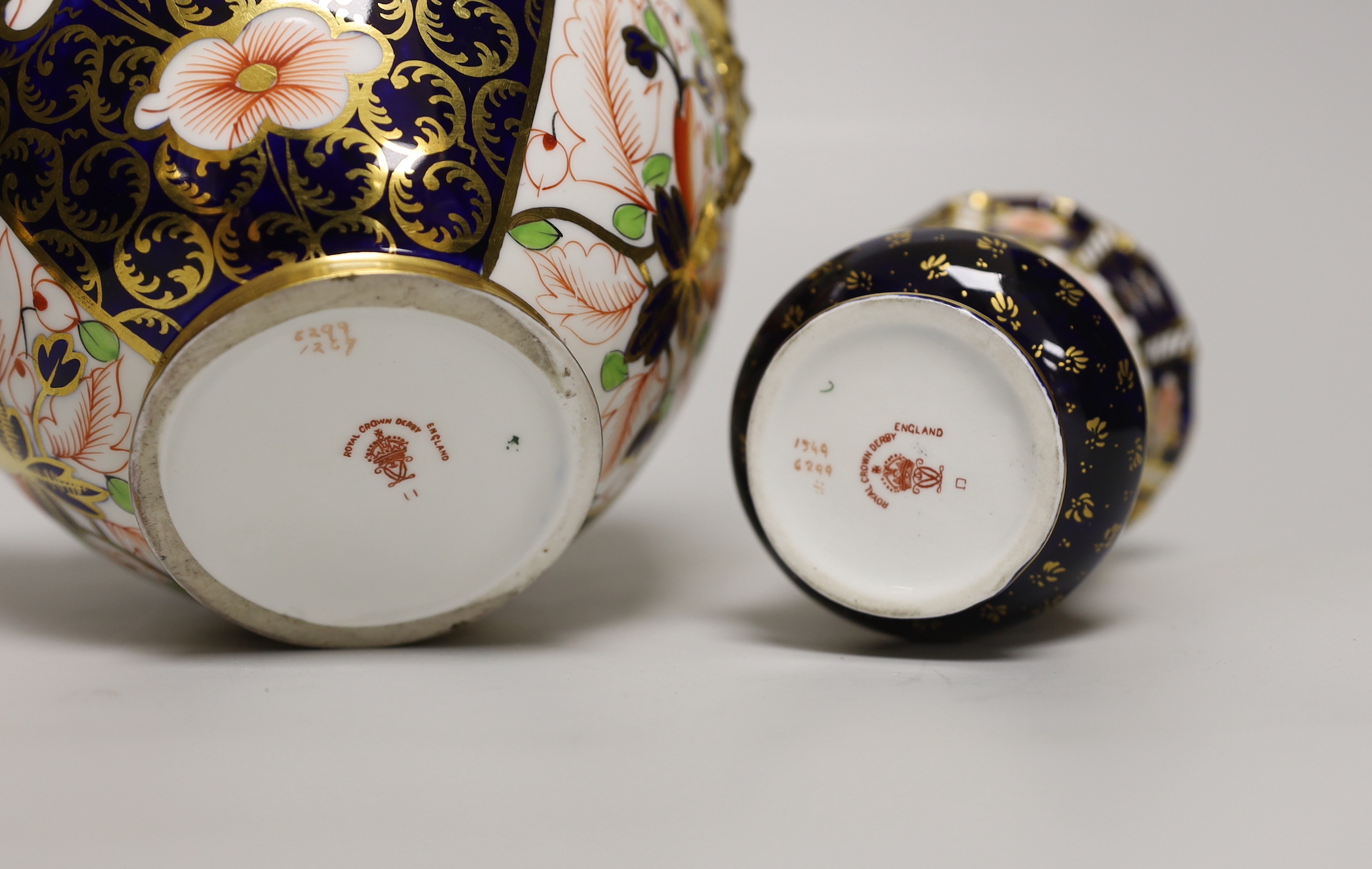 Seven pieces of Royal Crown Derby Imari porcelain including a trio and twin handled jar and cover, the largest 21cm high